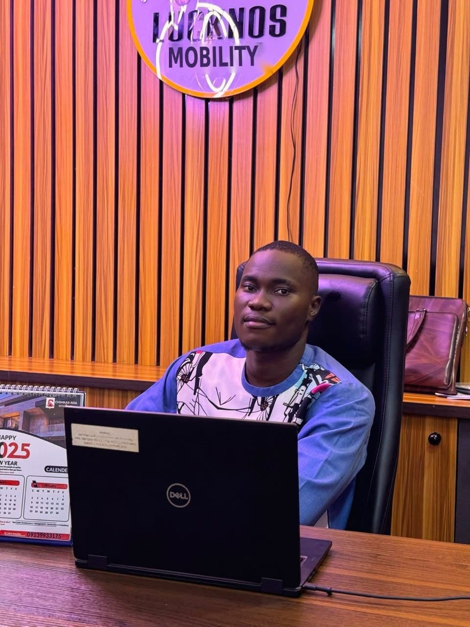 Lucknos Mobility team member working at the Asaba office
